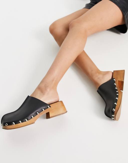 Zuecos negros plataforma plana de Mango | ASOS